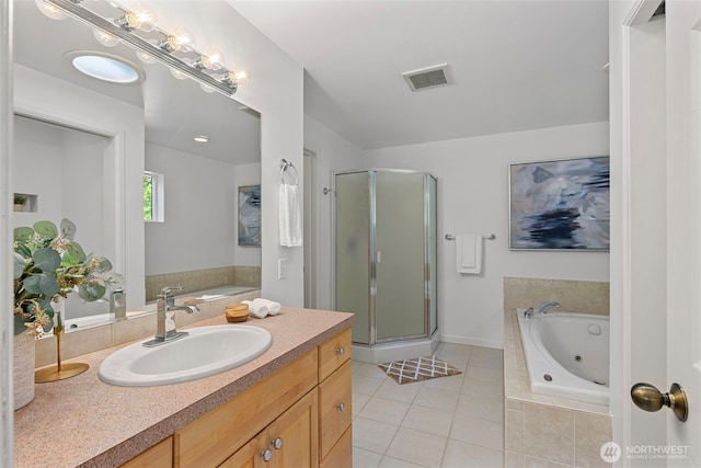 full bath featuring visible vents, a tub with jets, tile patterned flooring, and a stall shower