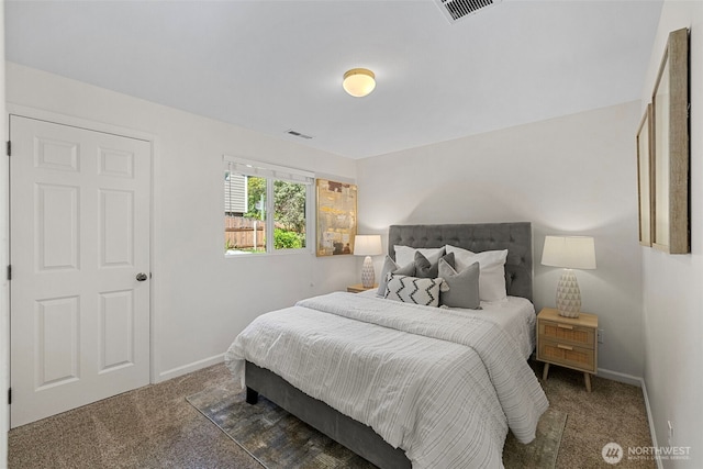 bedroom featuring baseboards, carpet, and visible vents