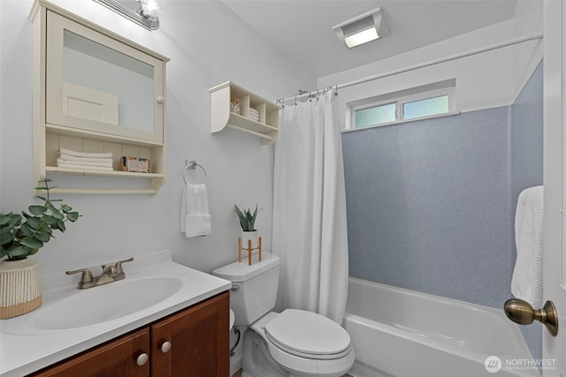 full bathroom featuring vanity, toilet, and shower / tub combo