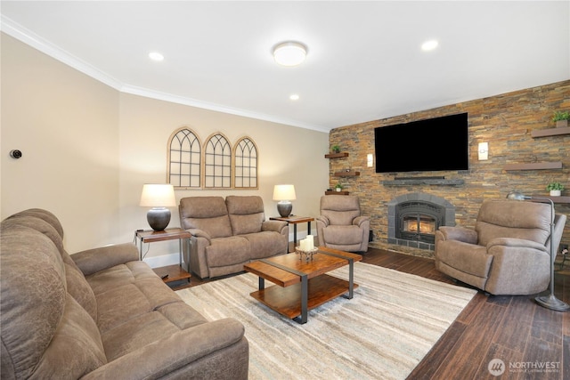 26217 137th Street Ct E, Buckley, WA 98321 - living room with crown molding, wood finished floors, baseboards, a lit fireplace, and recessed lighting