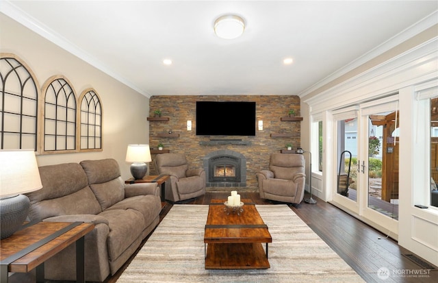 26217 137th Street Ct E, Buckley, WA 98321 - living room featuring recessed lighting, ornamental molding, wood finished floors, and a fireplace