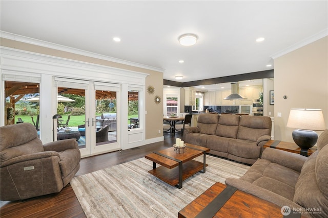 26217 137th Street Ct E, Buckley, WA 98321 - living area with crown molding, recessed lighting, french doors, and dark wood finished floors