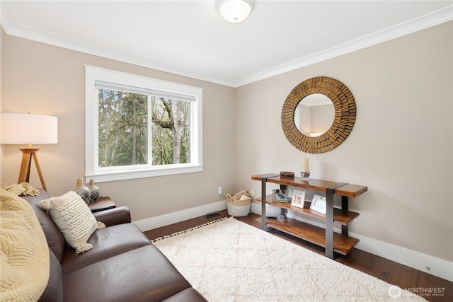 26217 137th Street Ct E, Buckley, WA 98321 - living area featuring baseboards, ornamental molding, wood finished floors, and visible vents
