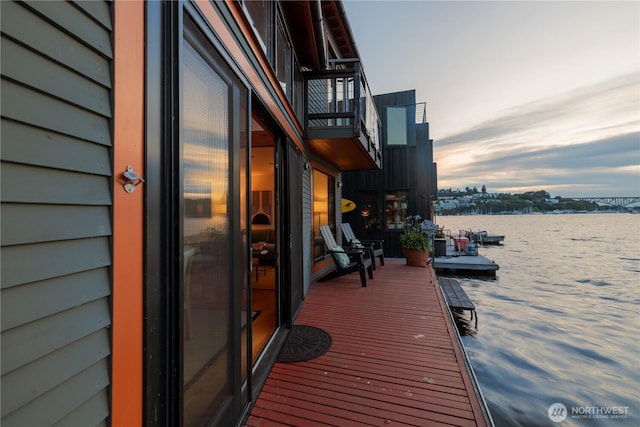 2235 Fairview Ave E Unit 12, Seattle, WA 98102 - deck featuring a water view and a boat dock
