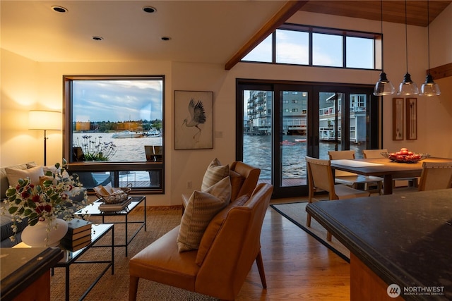 2235 Fairview Ave E Unit 12, Seattle, WA 98102 - living room featuring wood finished floors, recessed lighting, and a water view
