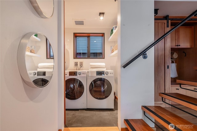 2235 Fairview Ave E Unit 12, Seattle, WA 98102 - laundry area featuring washing machine and dryer