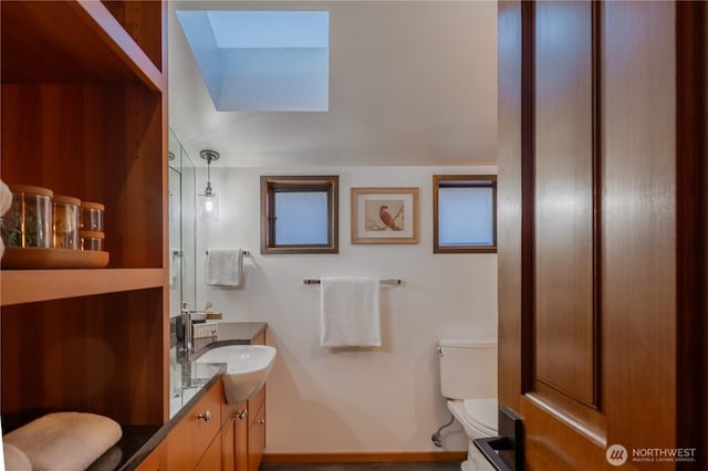 2235 Fairview Ave E Unit 12, Seattle, WA 98102 - bathroom with a skylight and vanity