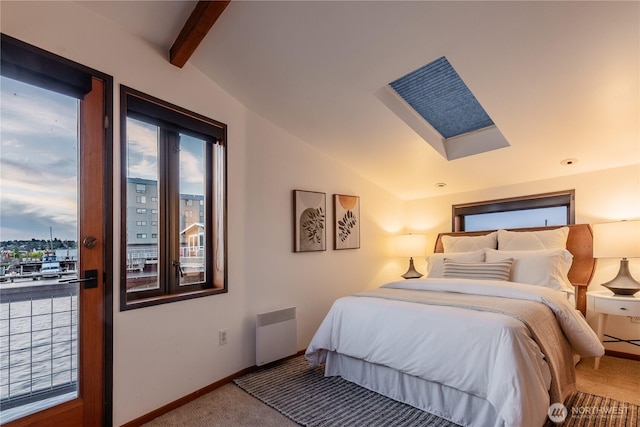 2235 Fairview Ave E Unit 12, Seattle, WA 98102 - carpeted bedroom featuring radiator, a skylight, and beam ceiling