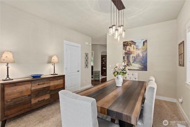 5603 116th St NE, Marysville, WA 98271 - dining space with an inviting chandelier, baseboards, and light carpet