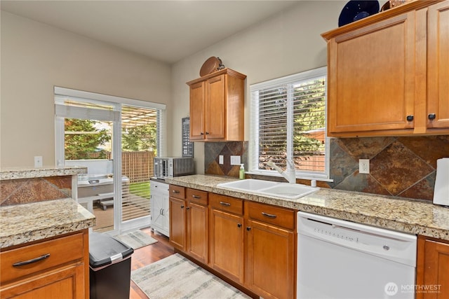 5603 116th St NE, Marysville, WA 98271 - kitchen featuring a sink, light countertops, a wealth of natural light, and dishwasher