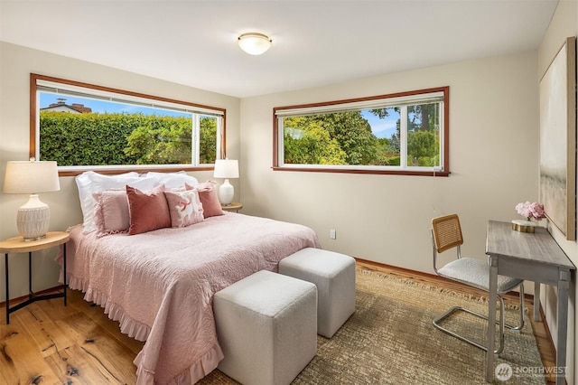 bedroom featuring wood finished floors