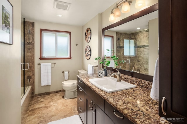 full bath with plenty of natural light, visible vents, toilet, and vanity
