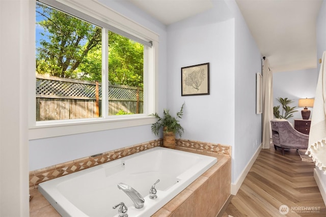 full bath with a garden tub