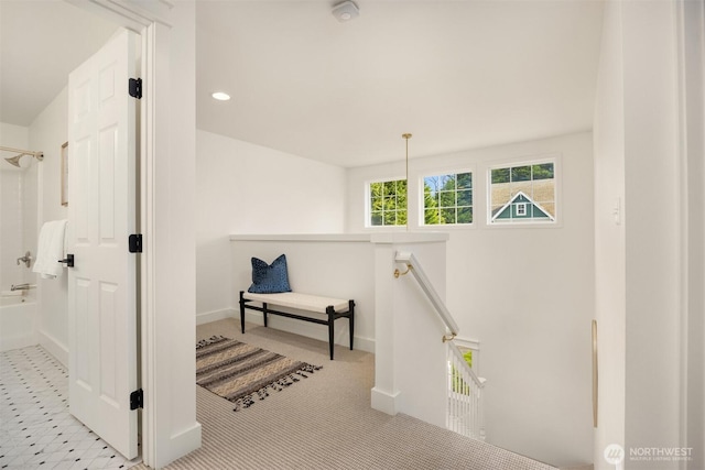 interior space featuring recessed lighting and baseboards