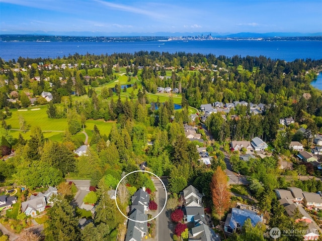 aerial view featuring a residential view and a water view