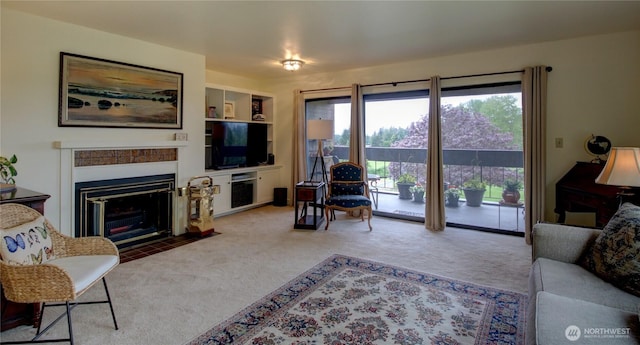 carpeted living area with a fireplace with flush hearth and built in features