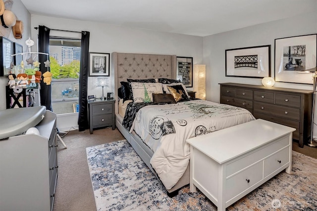 bedroom with light carpet