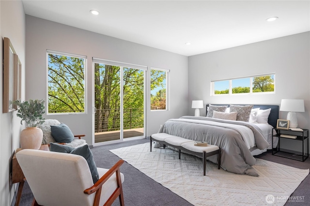 carpeted bedroom featuring access to outside and recessed lighting