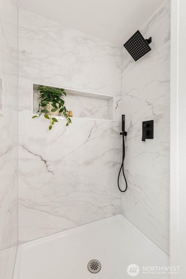 full bath featuring walk in shower