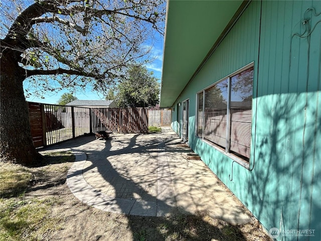 exterior space featuring a patio and fence