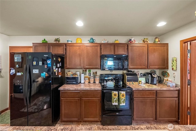 kitchen featuring recessed lighting, light stone counters, black appliances, and brown cabinets