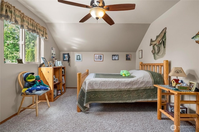 bedroom featuring carpet flooring, ceiling fan, vaulted ceiling, and baseboards