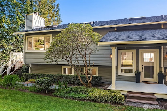 13967 SW 248th St, Vashon, WA 98070 - rear view of house featuring stairway and a chimney