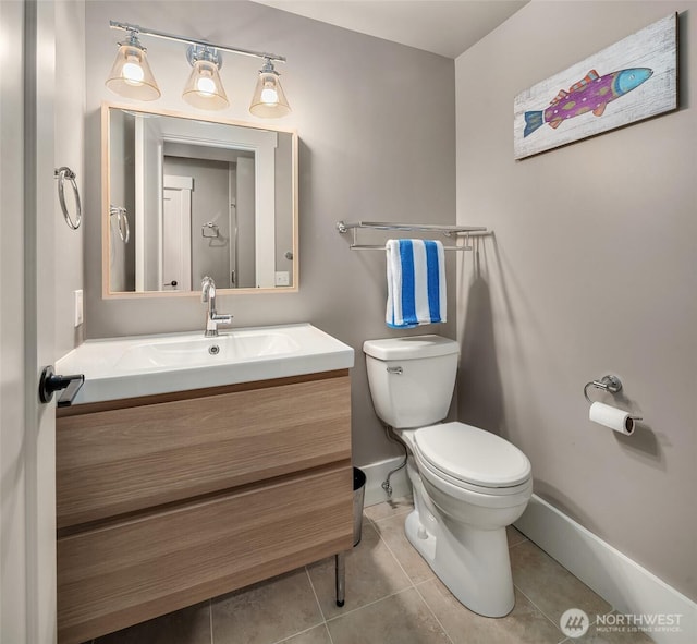 13967 SW 248th St, Vashon, WA 98070 - bathroom with baseboards, tile patterned flooring, vanity, and toilet