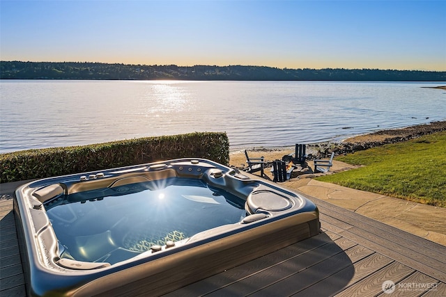 13967 SW 248th St, Vashon, WA 98070 - exterior space with an outdoor hot tub and a water view