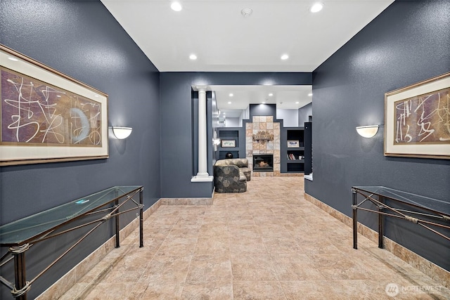 interior space with recessed lighting and baseboards