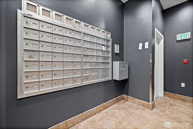 view of home's community with mail area