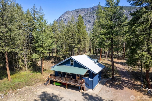 225C Lost River Rd, Mazama, WA 98833 - drone / aerial view featuring a wooded view and a mountain view