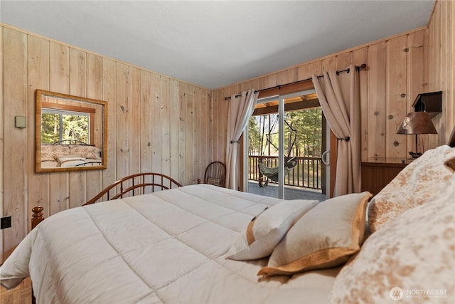 225C Lost River Rd, Mazama, WA 98833 - bedroom with wooden walls, access to outside, and multiple windows