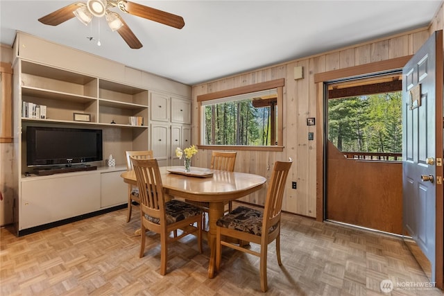 225C Lost River Rd, Mazama, WA 98833 - dining room with a ceiling fan and wood walls