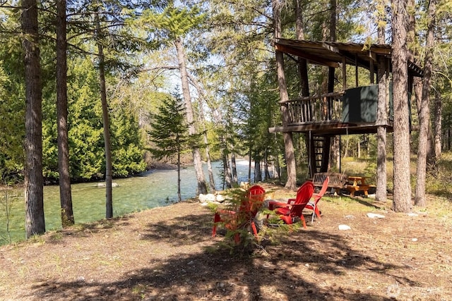 225C Lost River Rd, Mazama, WA 98833 - view of yard with a deck with water view and stairway