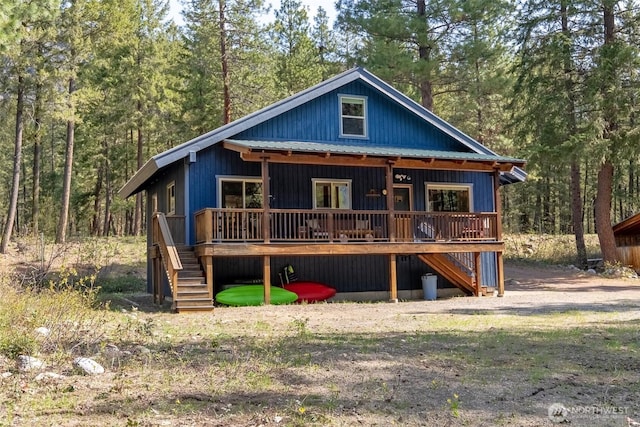 225C Lost River Rd, Mazama, WA 98833 - rustic home featuring stairs and a forest view