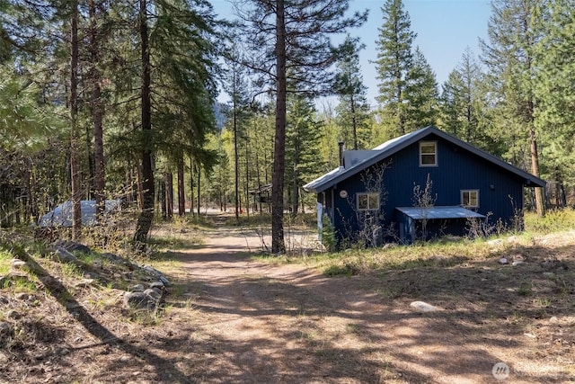 225C Lost River Rd, Mazama, WA 98833 - view of property exterior featuring a view of trees