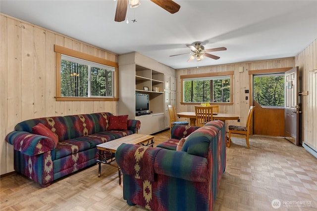 225C Lost River Rd, Mazama, WA 98833 - living room with ceiling fan and wood walls
