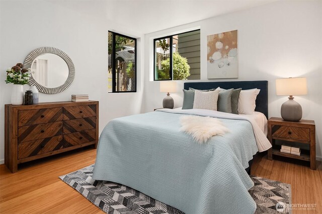 bedroom featuring wood finished floors