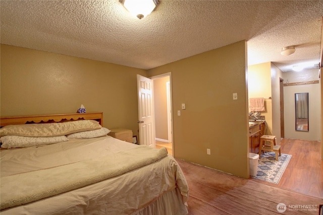 bedroom featuring a textured ceiling