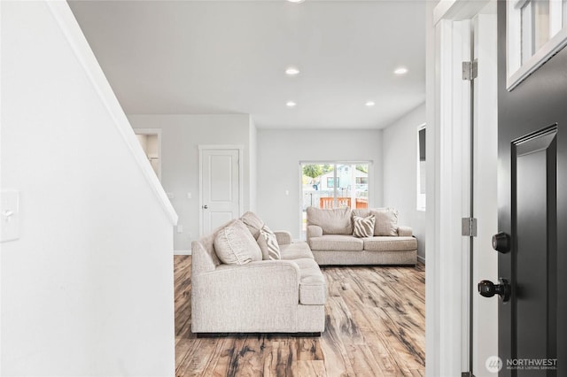 1824 E Fairbanks St, Tacoma, WA 98404 - living area with wood finished floors, recessed lighting, baseboards, and stairway