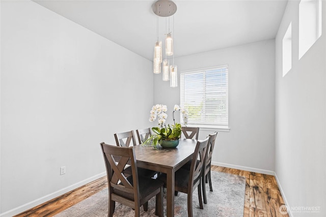 1824 E Fairbanks St, Tacoma, WA 98404 - dining area with baseboards and wood finished floors