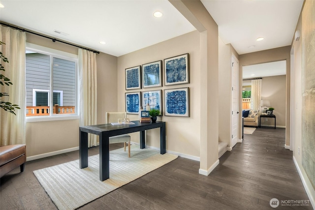 home office with dark wood-type flooring, recessed lighting, and baseboards