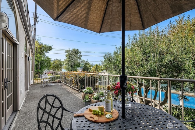 balcony featuring outdoor dining space