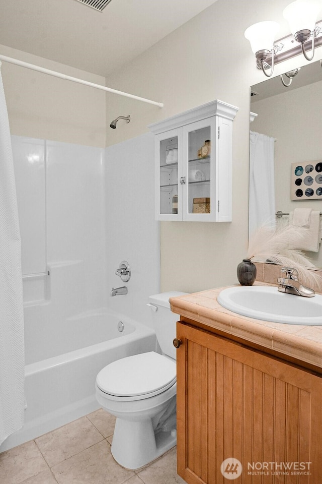 7854 Stroud Ave N, Seattle, WA 98103 - bathroom featuring toilet, visible vents, tile patterned flooring, shower / bathtub combination with curtain, and vanity