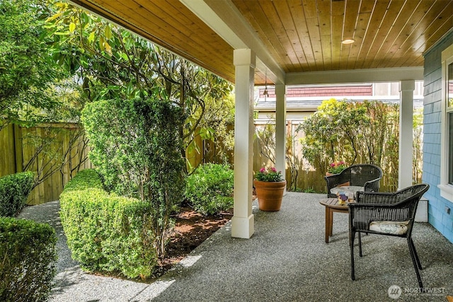 7854 Stroud Ave N, Seattle, WA 98103 - view of patio with a fenced backyard