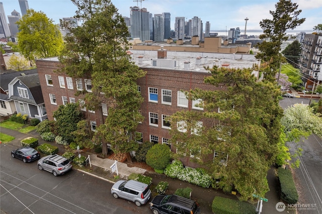 view of property with a city view