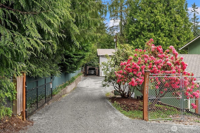 view of gate with fence