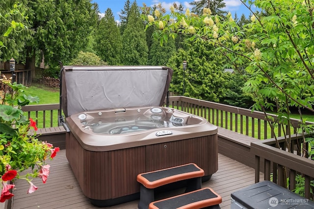 wooden terrace with a hot tub
