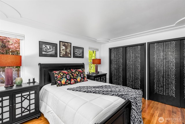 bedroom featuring wood finished floors